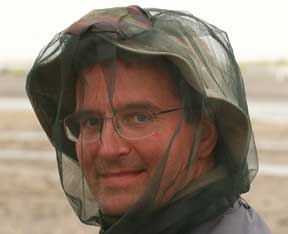 Dr. Art face with mosquito netting.