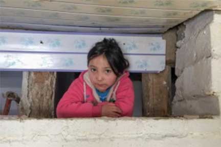 Mongolian girl looking at her visitors