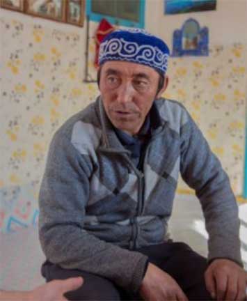 Ardak in his kitchen