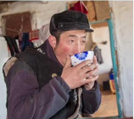 Drinking tea from a cup