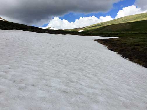 There is still snow on the mountains in June