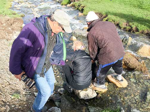 Slipping on the slippery rocks as we crossed the stream