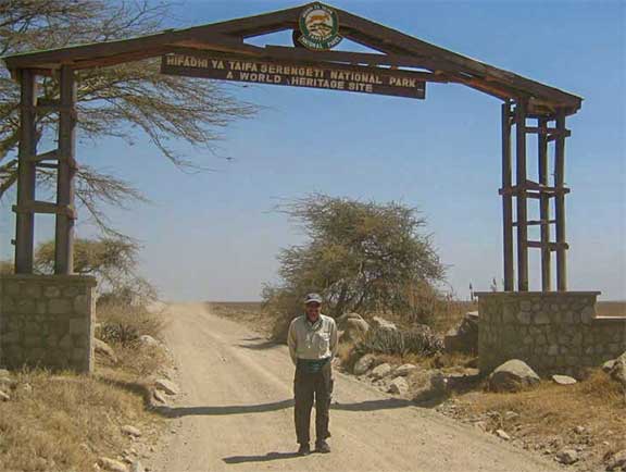 Dr. P standing at the entrance to the Serengeti