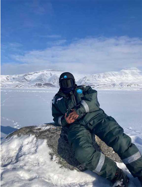 Dr P in high arctic over a frozen fjord
