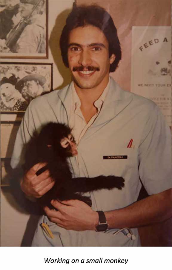 Dr P holding a young monkey