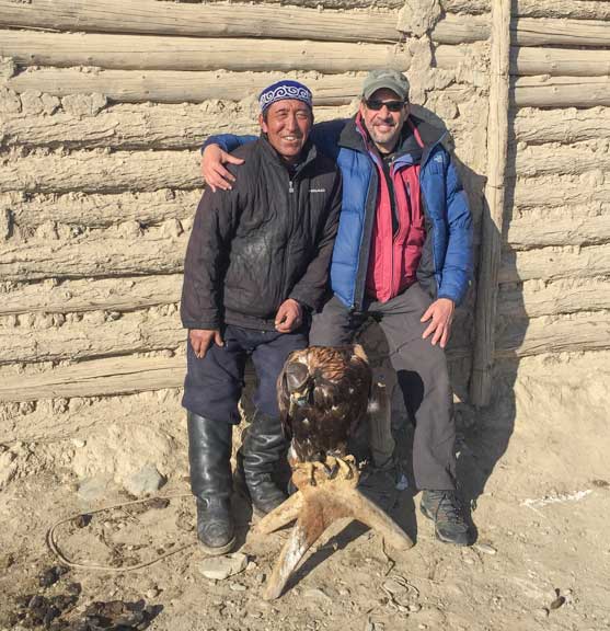 Dr. P with Mongolian master eagle falconer and his golden eagle