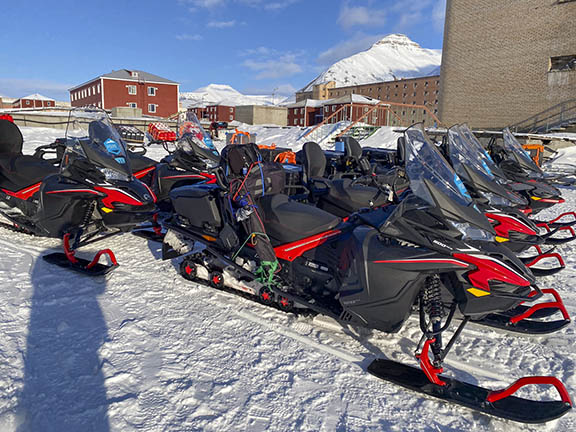 Snowmobiles parked at Pyramiden.
