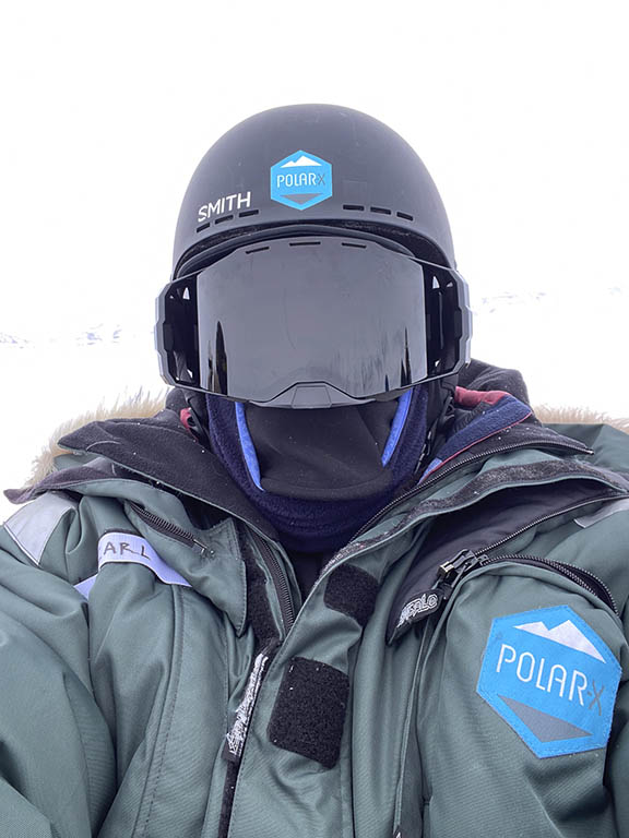 Svalbard polar bear snowmobile suit with helmet. 