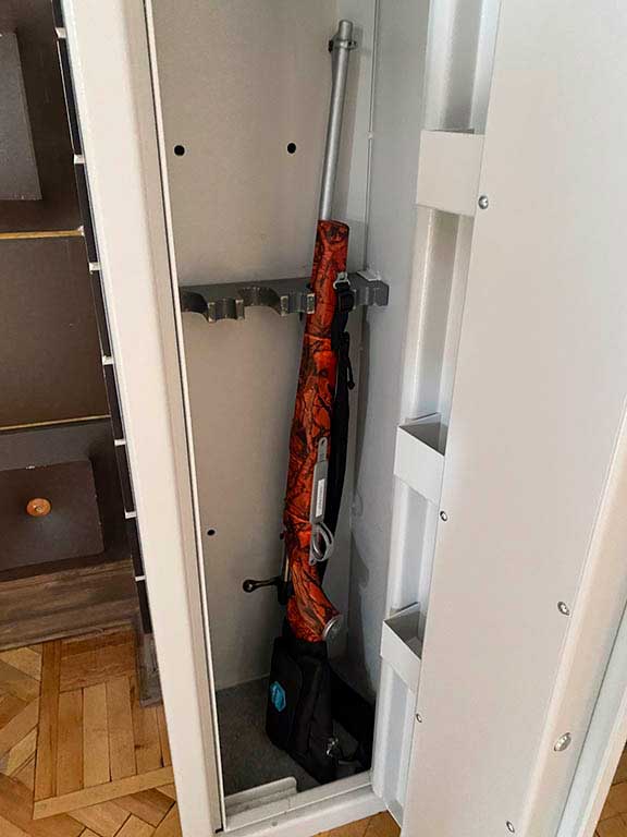 Rifle in gun locker.