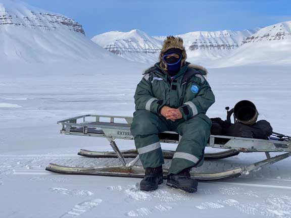 Dr. P sitting on the sled