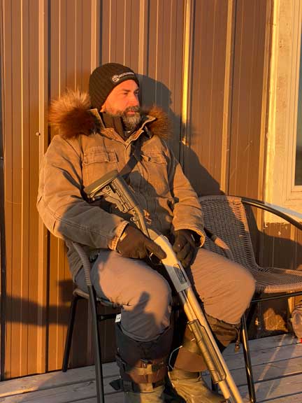 Guide with rifle