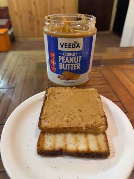 Peanut butter jar and toast
