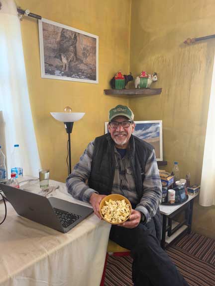 Dr. P with popcorn during his presentation