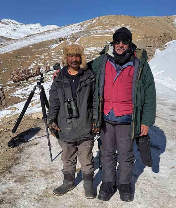 Dr. P standing with his porter named Chopelle