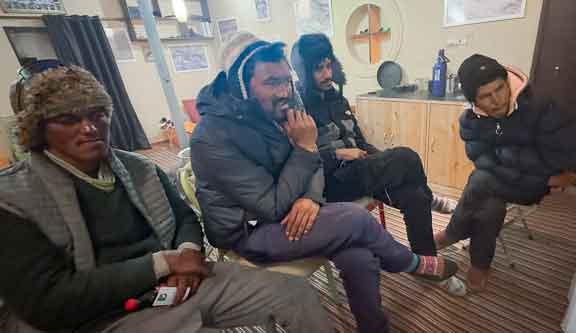 The guides watching Dr. P's slide show