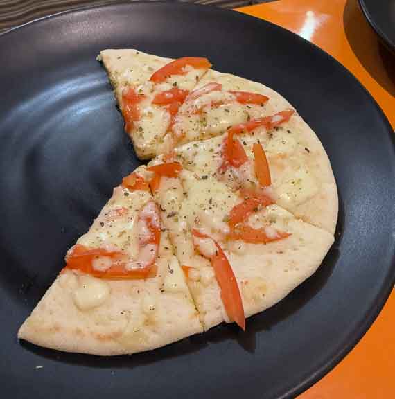 Half eaten pizza